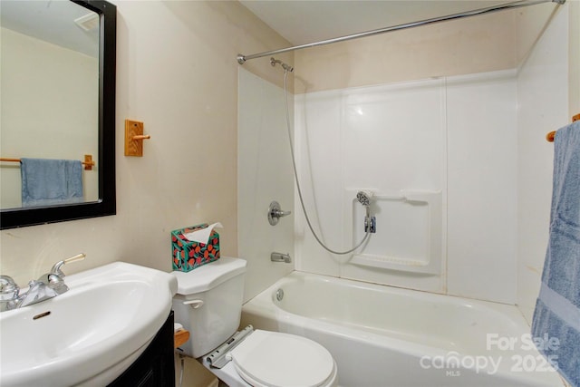 full bathroom with vanity,  shower combination, and toilet