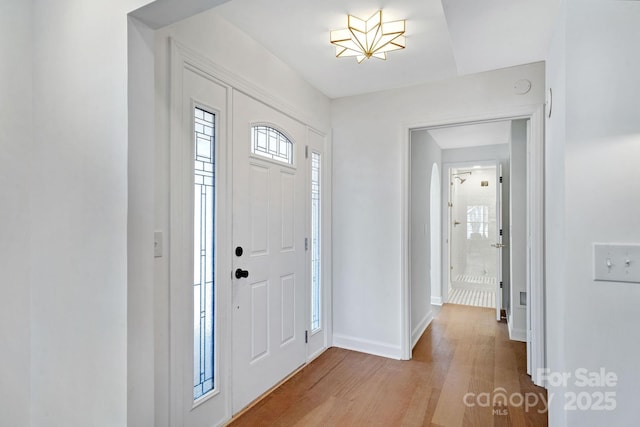 foyer with light hardwood / wood-style flooring