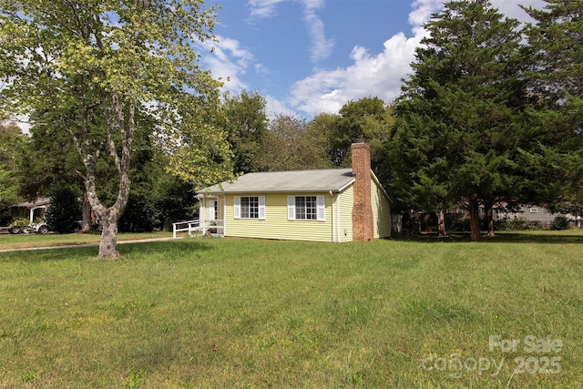 exterior space featuring a front lawn