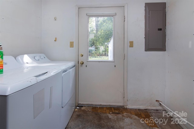 clothes washing area with independent washer and dryer, electric panel, and dark parquet floors