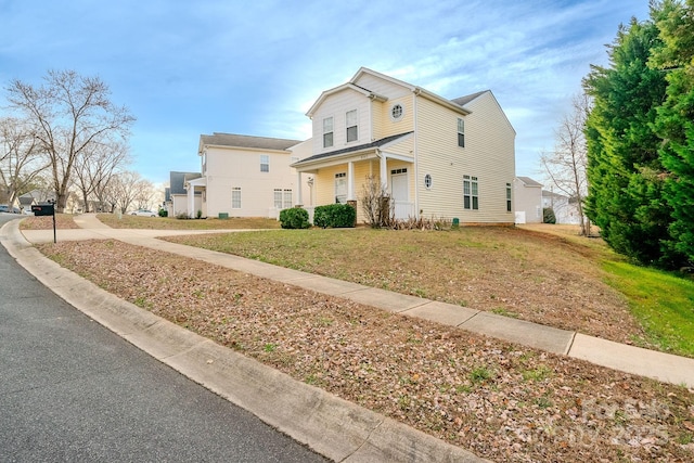 view of front property with a front lawn