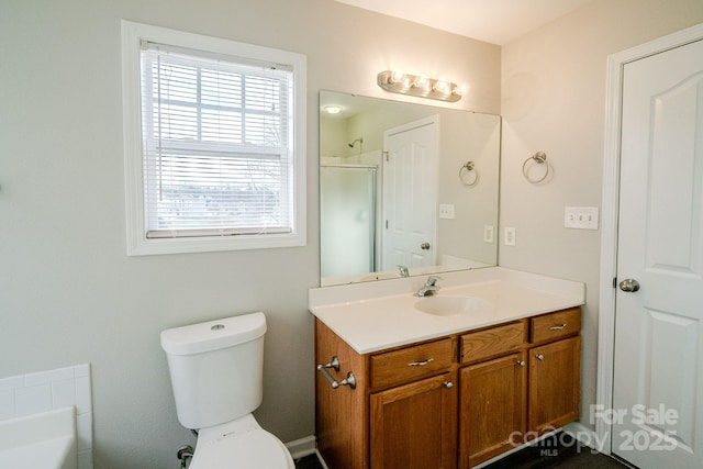 full bathroom featuring vanity, toilet, and plus walk in shower