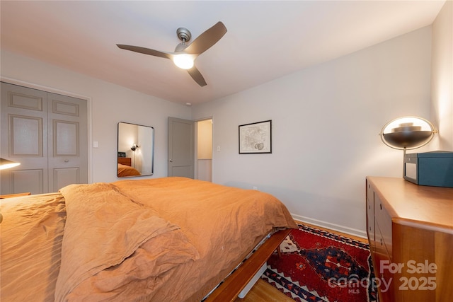 bedroom featuring ceiling fan