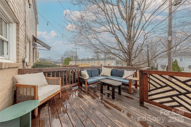 deck with an outdoor hangout area