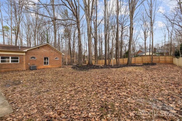 view of yard with central AC