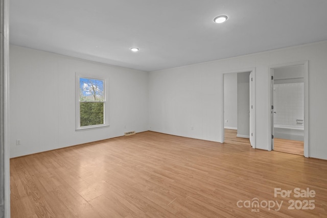 empty room featuring light hardwood / wood-style flooring