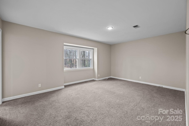 view of carpeted spare room