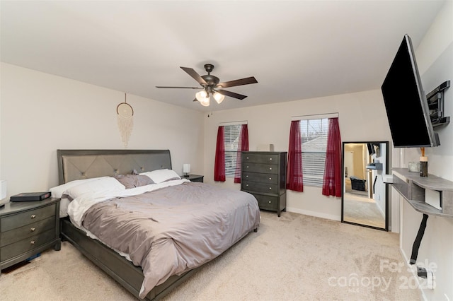 bedroom with light carpet and ceiling fan