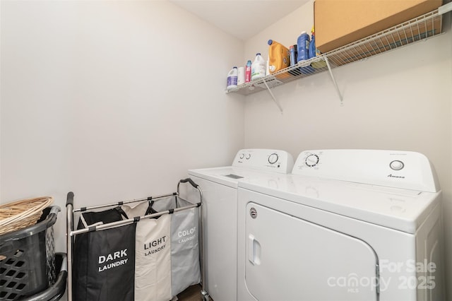 laundry area featuring laundry area and independent washer and dryer