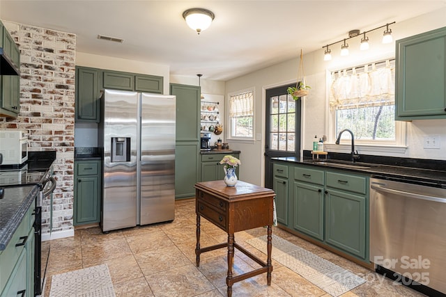 170 Hillcrest Dr, Columbus, NC 28722 - kitchen with green cabinetry and appliances with stainless steel finishes