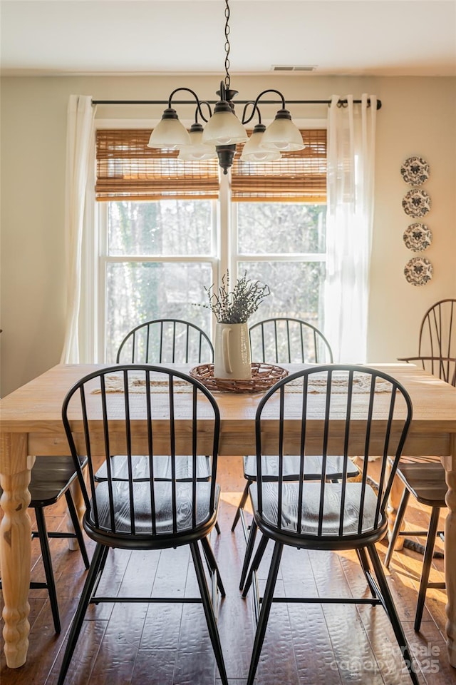 170 Hillcrest Dr, Columbus, NC 28722 - dining room featuring hardwood / wood-style floors and a chandelier