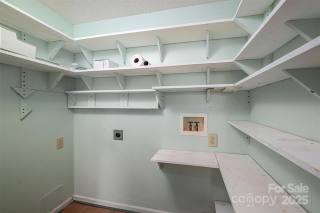 laundry room featuring washer hookup and hookup for an electric dryer