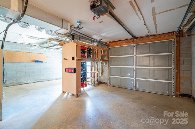 garage featuring a garage door opener