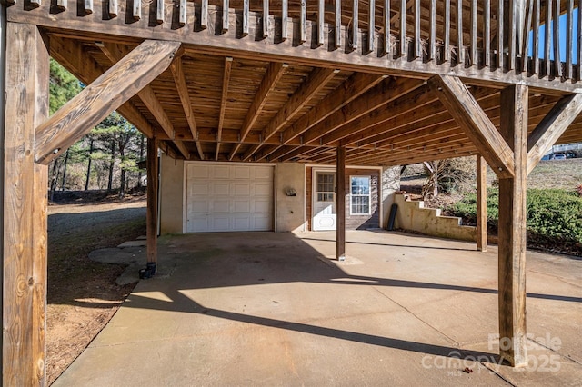 view of patio / terrace with a garage