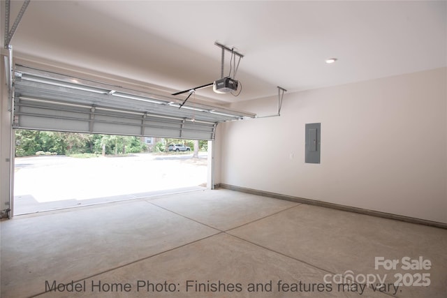 garage featuring a garage door opener and electric panel