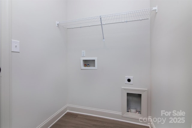 clothes washing area featuring laundry area, baseboards, wood finished floors, hookup for an electric dryer, and washer hookup