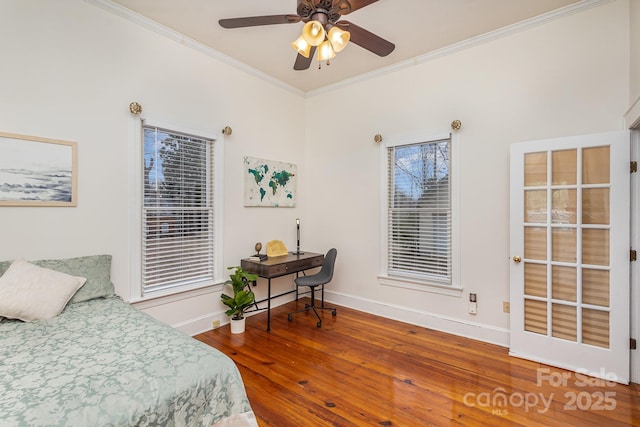 bedroom featuring crown molding, ceiling fan, and hardwood / wood-style flooring