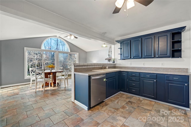 kitchen featuring blue cabinetry, lofted ceiling, dishwasher, and kitchen peninsula