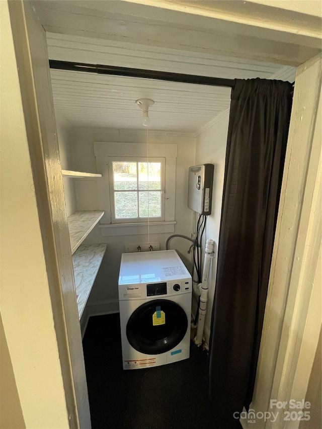 laundry area with crown molding