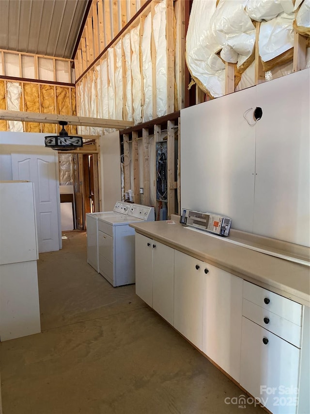 laundry area featuring cabinets and washer and dryer