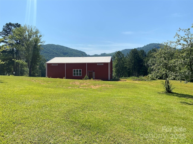 1180 Calton Rd, Bostic, NC 28018 - view of grassy yard featuring a mountain view and an outbuilding