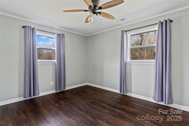 spare room with crown molding, ceiling fan, and wood-type flooring