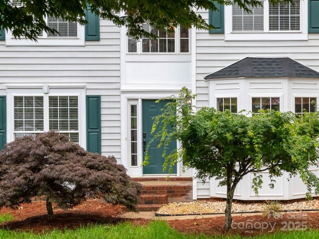 172 Foxtail Dr, Mooresville, NC 28117 - entrance to property with roof with shingles