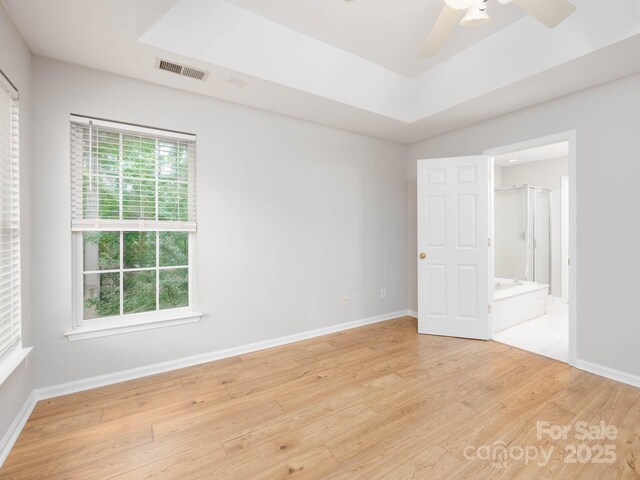 172 Foxtail Dr, Mooresville, NC 28117 - empty room featuring light wood-style flooring, ceiling fan, and baseboards
