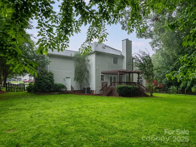 172 Foxtail Dr, Mooresville, NC 28117 - back of house with stairs, a deck, a chimney, a pergola, and central AC