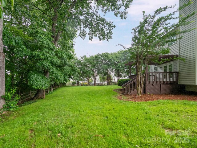 172 Foxtail Dr, Mooresville, NC 28117 - view of yard featuring a wooden deck, stairway, and french doors