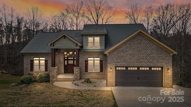 view of front of home with a garage