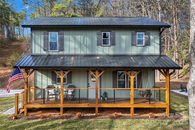 view of front of property featuring board and batten siding and covered porch