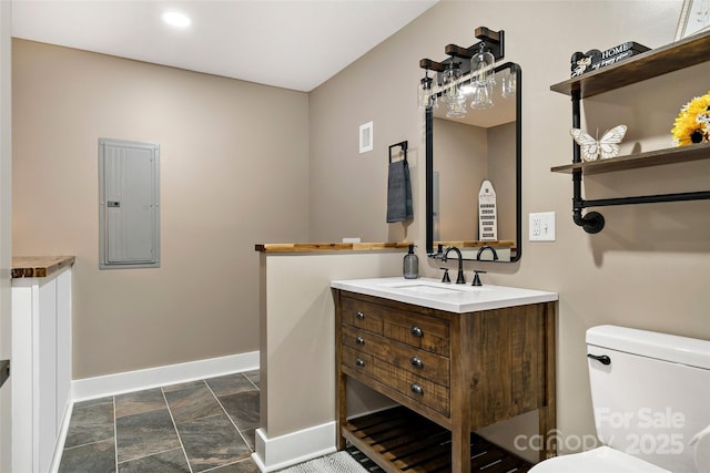 bathroom with visible vents, toilet, electric panel, baseboards, and vanity