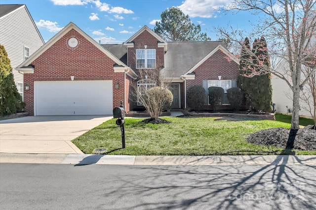 traditional-style house featuring a garage, a front yard, concrete driveway, and brick siding