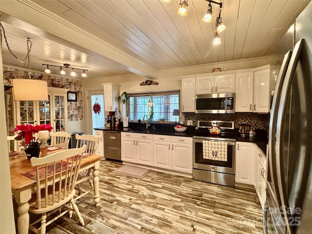 kitchen featuring sink, wood ceiling, light wood-type flooring, stainless steel appliances, and white cabinets