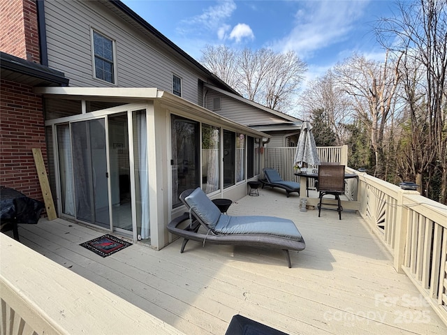 deck featuring a sunroom