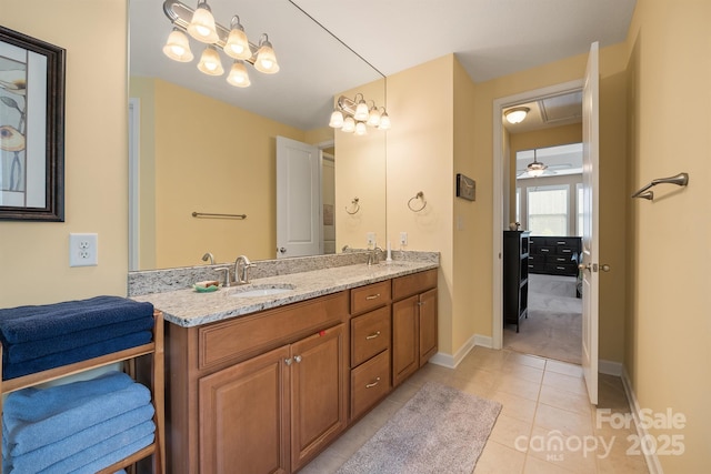 bathroom with vanity and tile patterned flooring