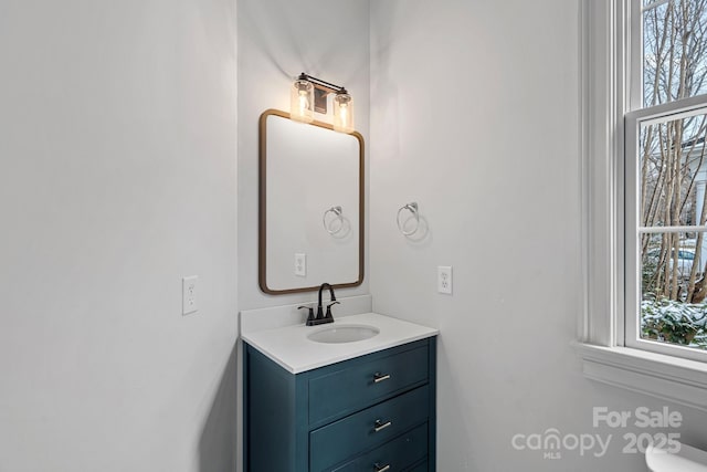 bathroom with a wealth of natural light and vanity