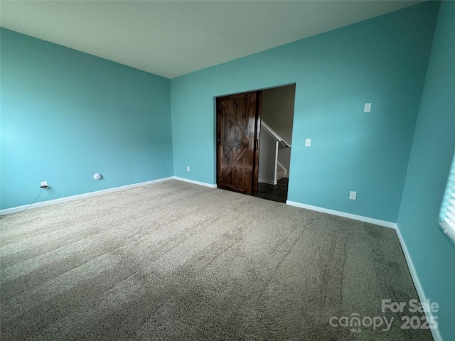 unfurnished bedroom with carpet floors