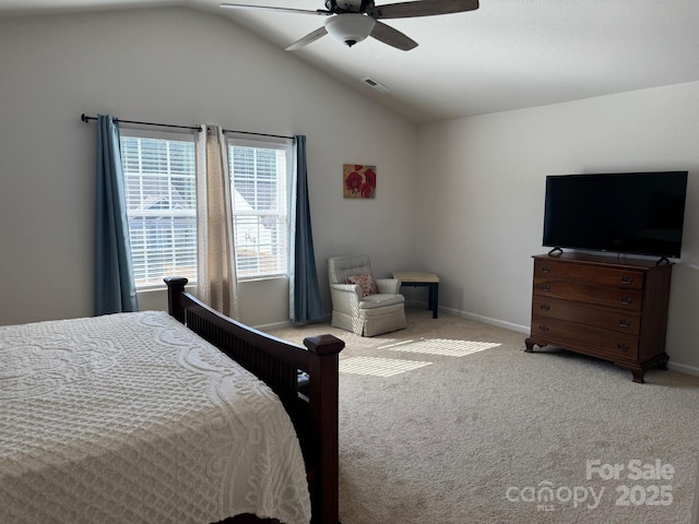 bedroom featuring ceiling fan, light colored carpet, and vaulted ceiling