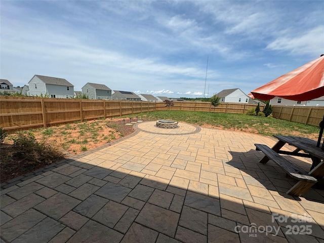 view of patio featuring a fire pit