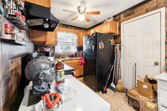 kitchen with sink, ceiling fan, ventilation hood, black appliances, and light tile patterned flooring