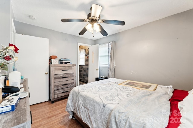 bedroom featuring ceiling fan and light hardwood / wood-style floors