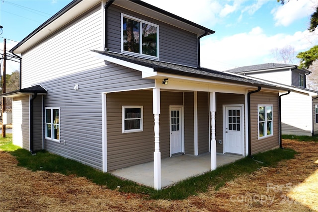 rear view of property with a patio