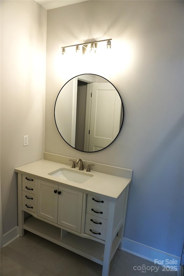 bathroom featuring vanity and tile patterned flooring