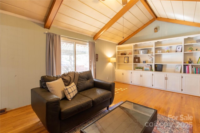 living room with vaulted ceiling with beams, wood ceiling, light hardwood / wood-style flooring, and wood walls