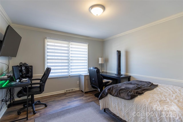 bedroom with ornamental molding and dark wood-type flooring