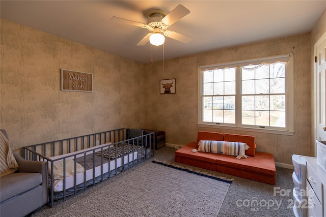 carpeted bedroom with ceiling fan