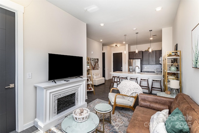 living room featuring dark hardwood / wood-style flooring