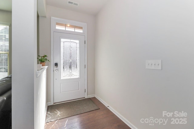 foyer entrance with hardwood / wood-style floors